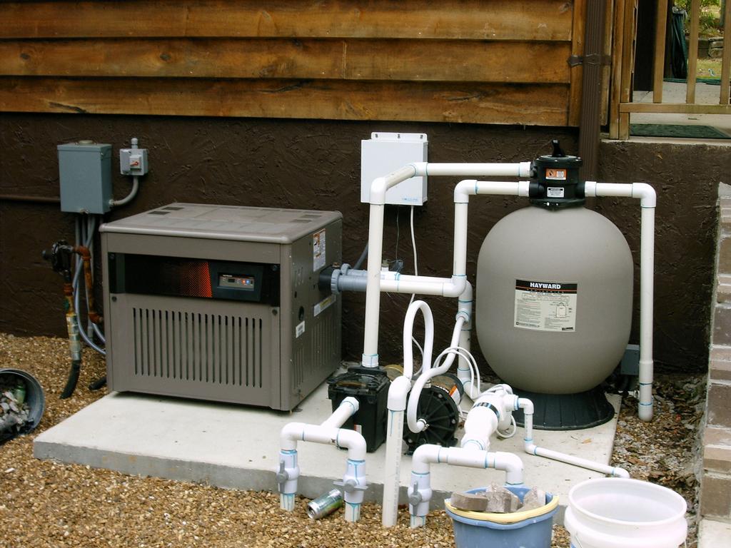 Pump and filter with heater from T L Marshall Custom Inground Pools in